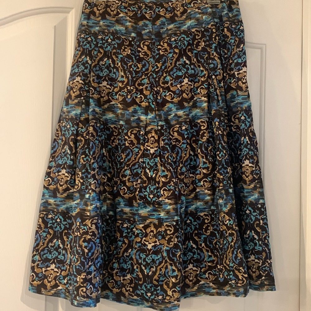 Style&Co size 10 line skirt. Side zipper brown skirt with shades of blue/browns